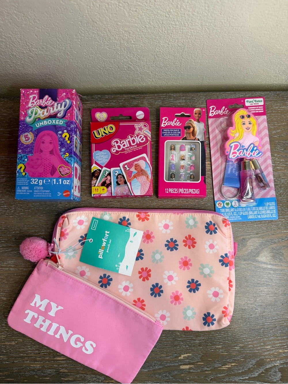 New Barbie Bundle Lip Gloss, Uno, Nails, Doll and cosmetic bag